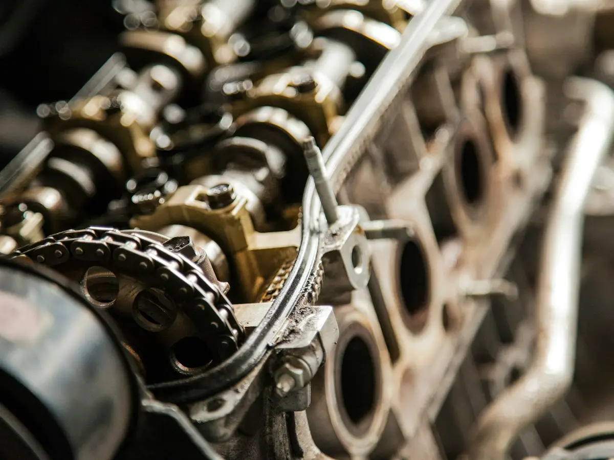 Close-up of a cylinder head and camshaft during engine work