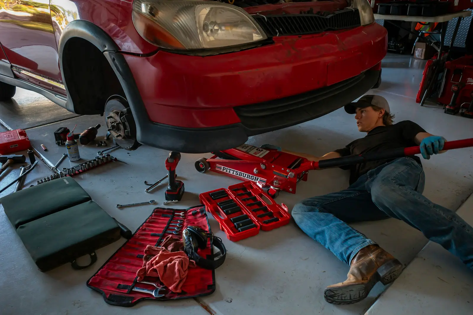 A car being worked on in the DREAM CARS workshop